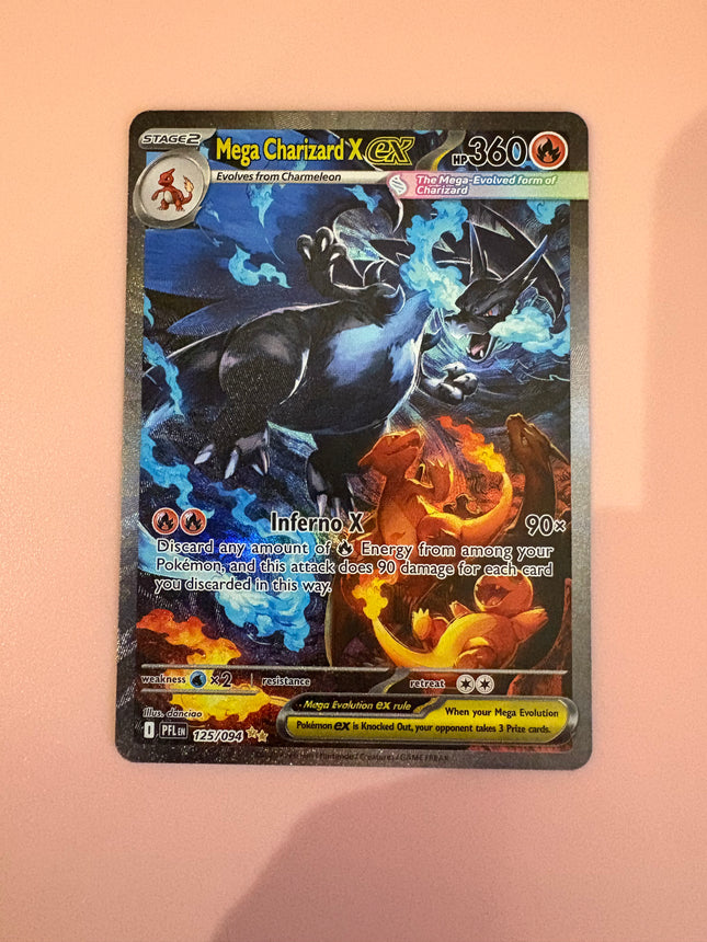 Pokémon trading card featuring Mega Charizard X on a peach-colored background